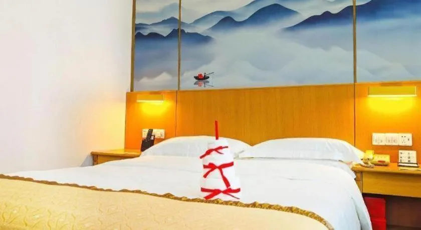 Bed in Xiamen Jingmin Central Hotel