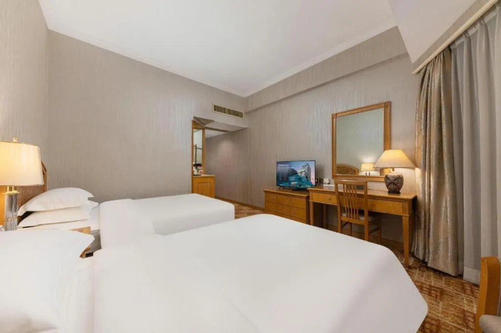 Bed in Century Plaza Hotel