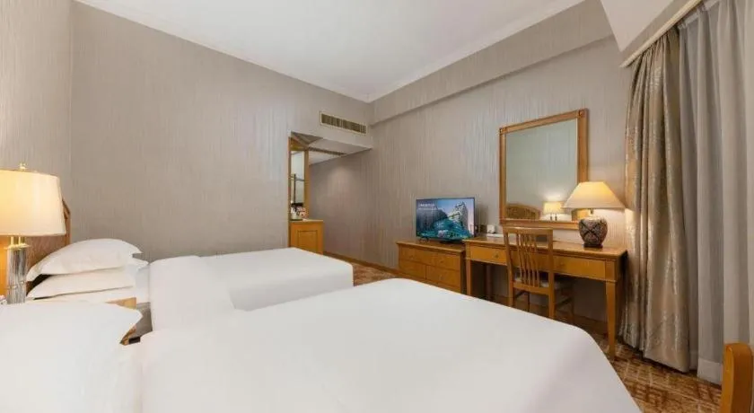 Bed in Century Plaza Hotel