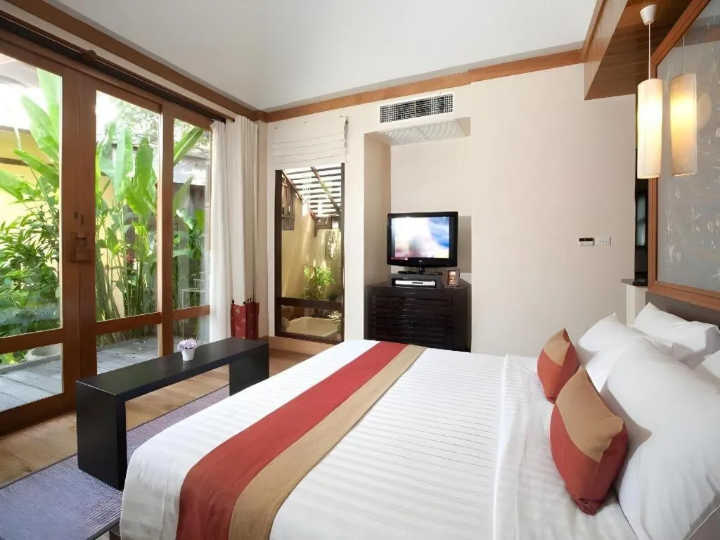 Bed in Baan Talay Dao Resort