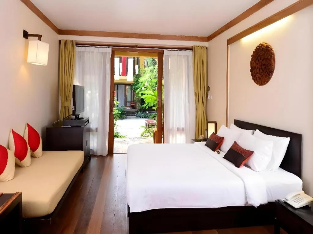 Bed in Baan Talay Dao Resort