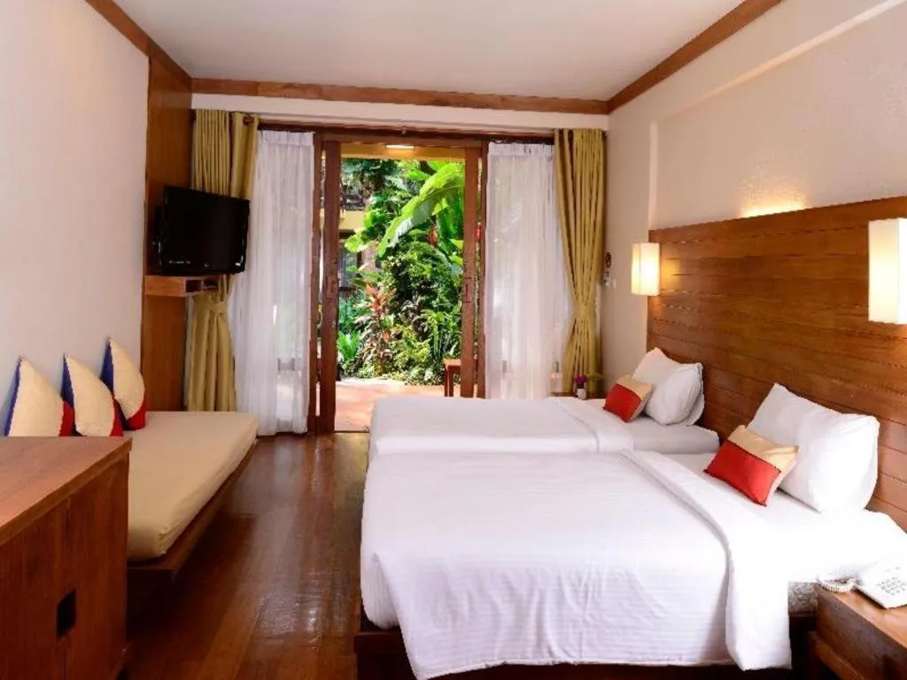 Bed in Baan Talay Dao Resort