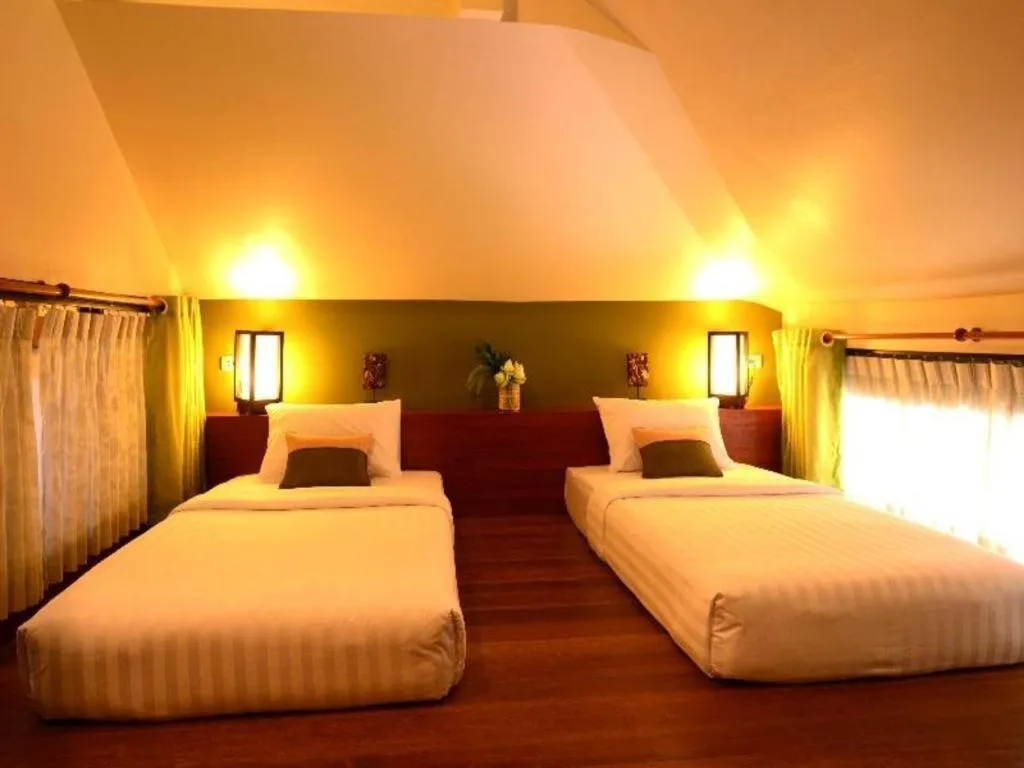 Bed in Baan Talay Dao Resort