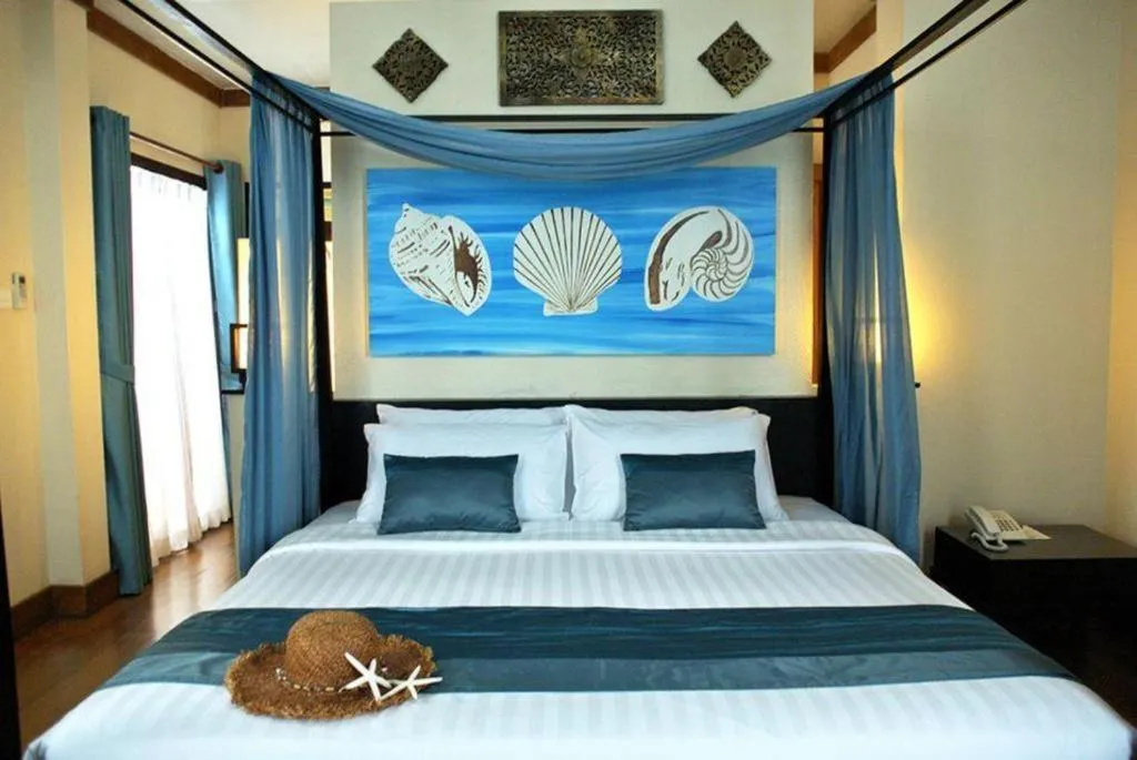 Bed in Baan Talay Dao Resort