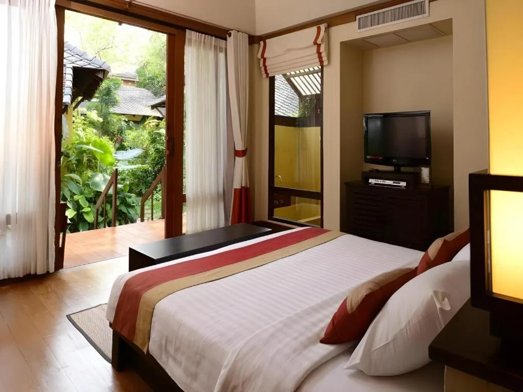 Bed in Baan Talay Dao Resort