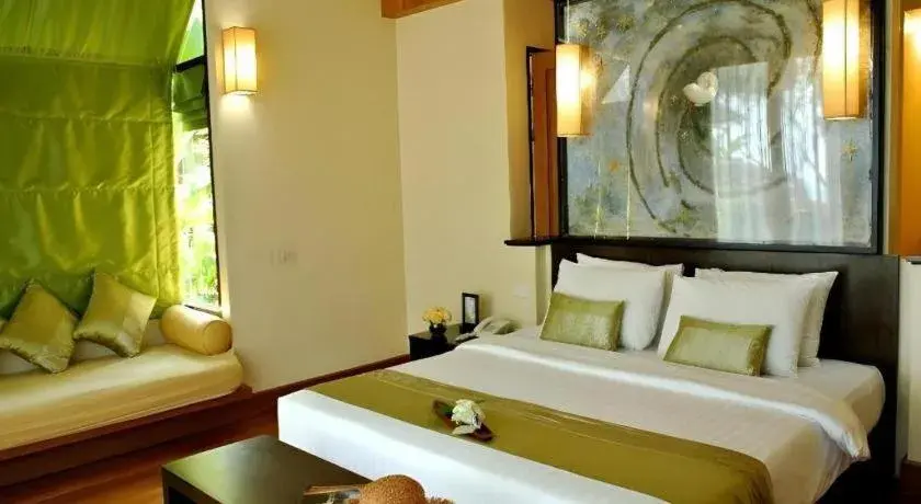 Bed in Baan Talay Dao Resort Bed in Baan Talay Dao Resort