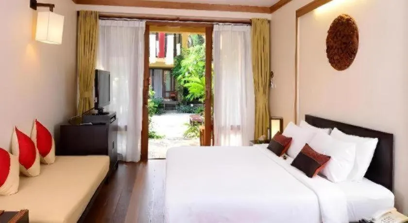 Bed in Baan Talay Dao Resort
