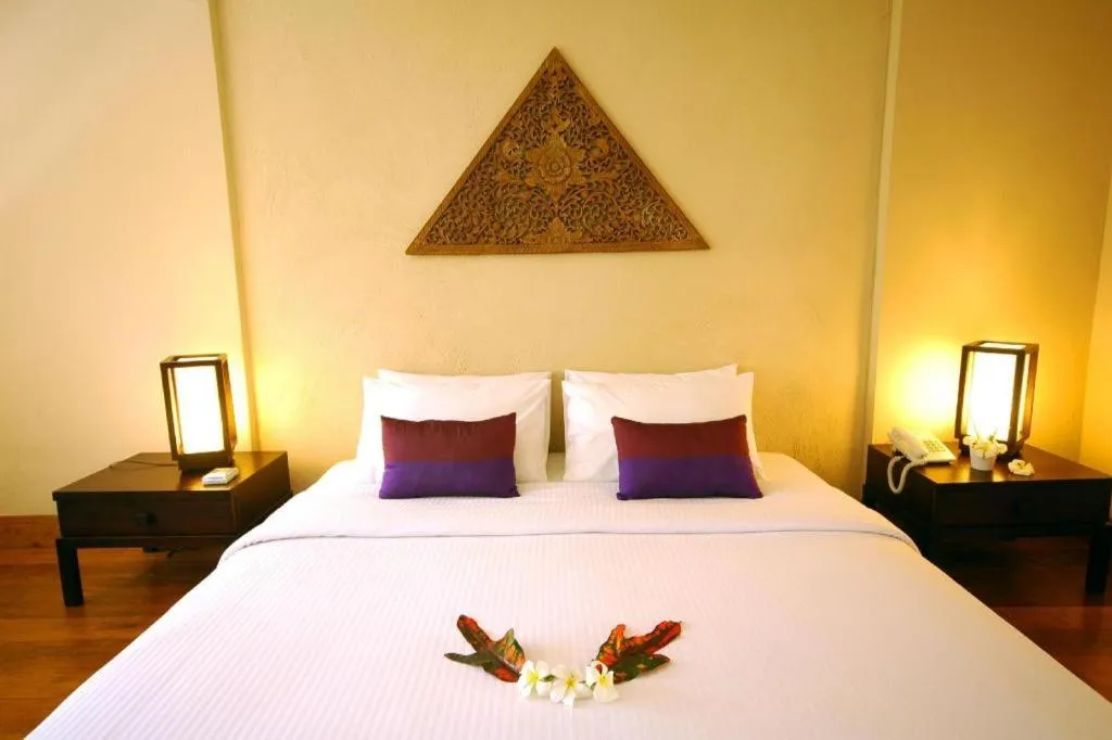 Bed in Baan Talay Dao Resort