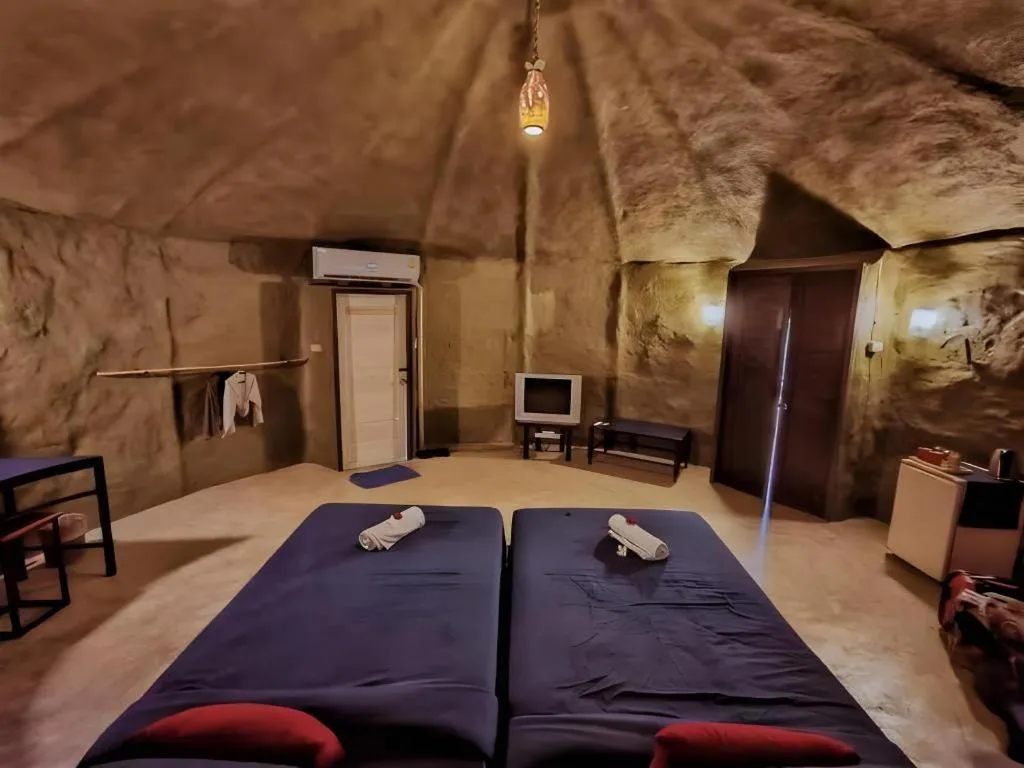 Bed in Avartarn Miracles Hotel