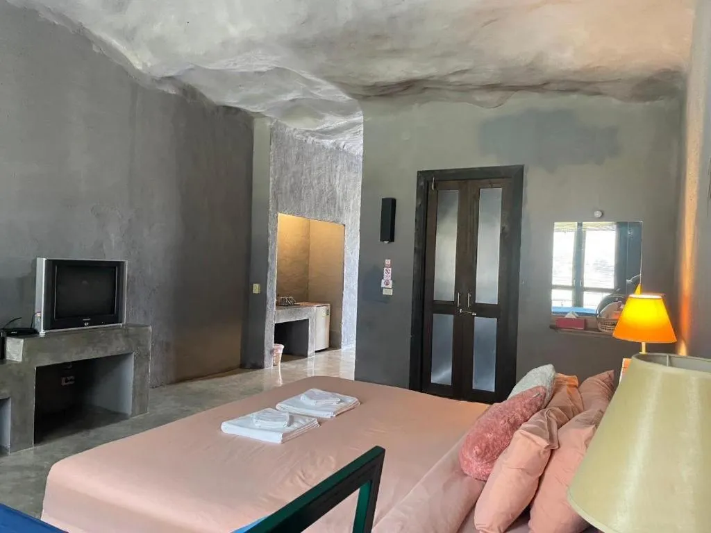 Bed in Avartarn Miracles Hotel