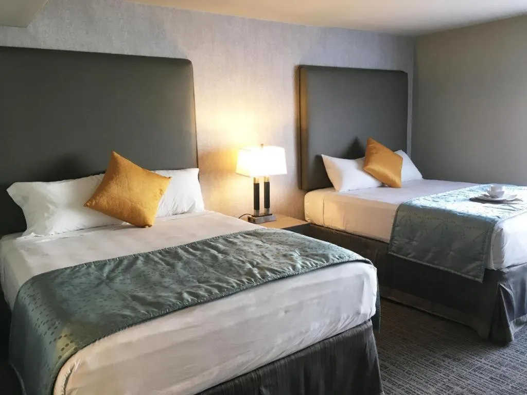 Bed in Arden Star Hotel