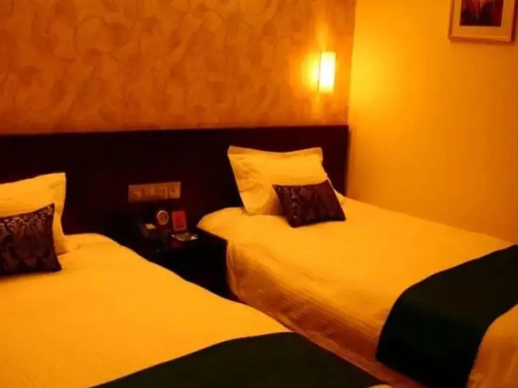 Bed in NanYing Hotel Shanghai