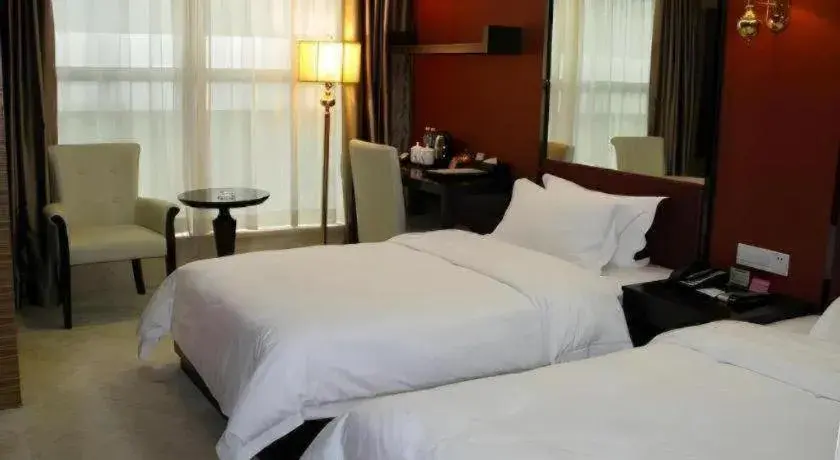 Bed in Milu Hotel Bed in Milu Hotel