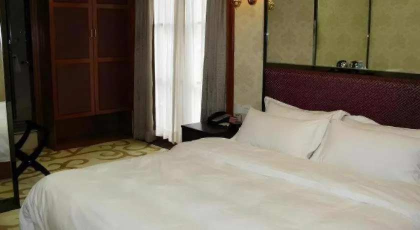 Bed in Milu Hotel