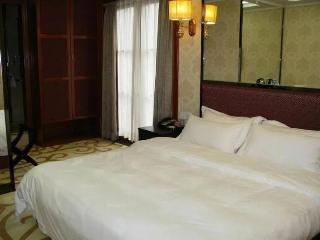 Bed in Milu Hotel