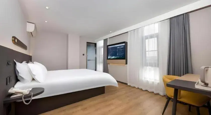 Bed in Jinjiang Inn Shenzhen Airport Bed in Jinjiang Inn Shenzhen Airport