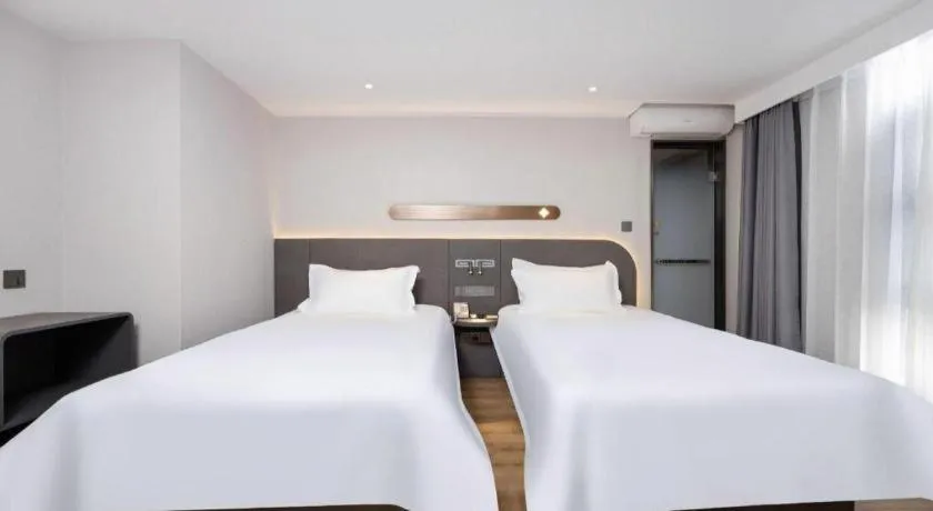 Bed in Jinjiang Inn Shenzhen Airport