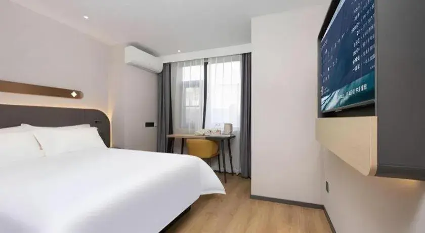 Bed in Jinjiang Inn Shenzhen Airport Bed in Jinjiang Inn Shenzhen Airport