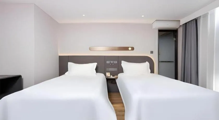 Bed in Jinjiang Inn Shenzhen Airport