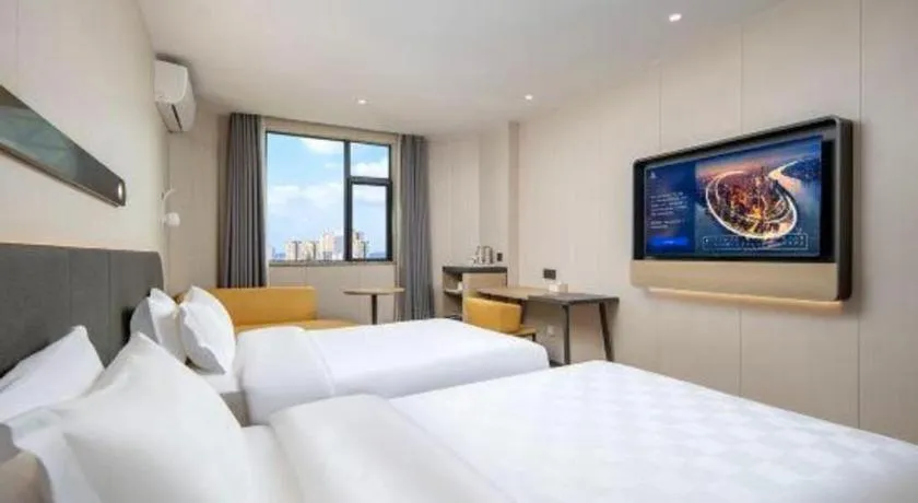 Bed in Jinjiang Inn Zhuhai Xiangzhou Qinglv Middle Road Theater