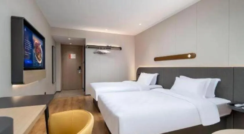 Bed in Jinjiang Inn Zhuhai Xiangzhou Qinglv Middle Road Theater