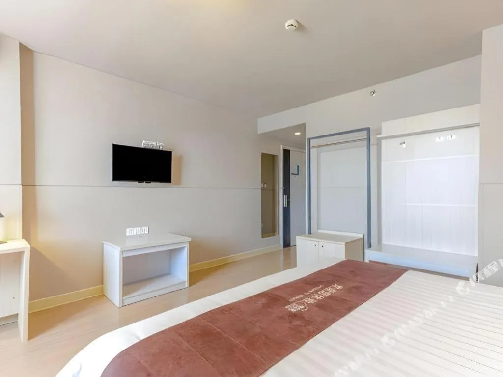 Bed in Jinjiang Inn Zhuhai Xiangzhou Qinglv Middle Road Theater