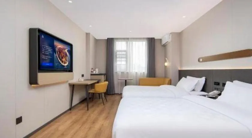 Bed in Jinjiang Inn Zhuhai Xiangzhou Qinglv Middle Road Theater