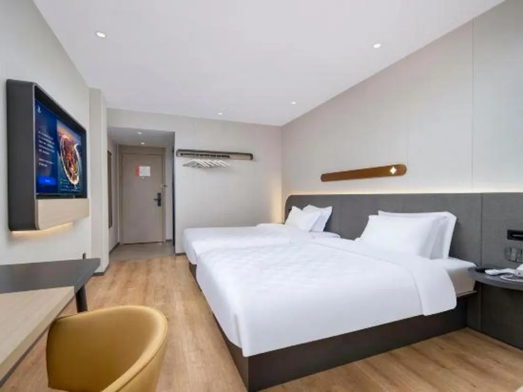 Bed in Jinjiang Inn Zhuhai Xiangzhou Qinglv Middle Road Theater