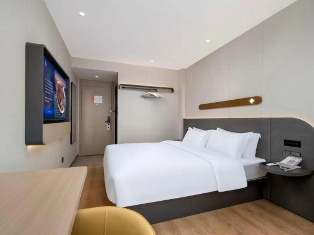 Bed in Jinjiang Inn Zhuhai Xiangzhou Qinglv Middle Road Theater