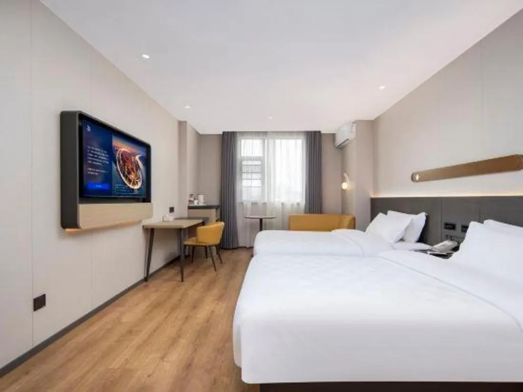 Bed in Jinjiang Inn Zhuhai Xiangzhou Qinglv Middle Road Theater