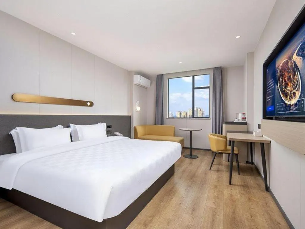 Bed in Jinjiang Inn Zhuhai Xiangzhou Qinglv Middle Road Theater