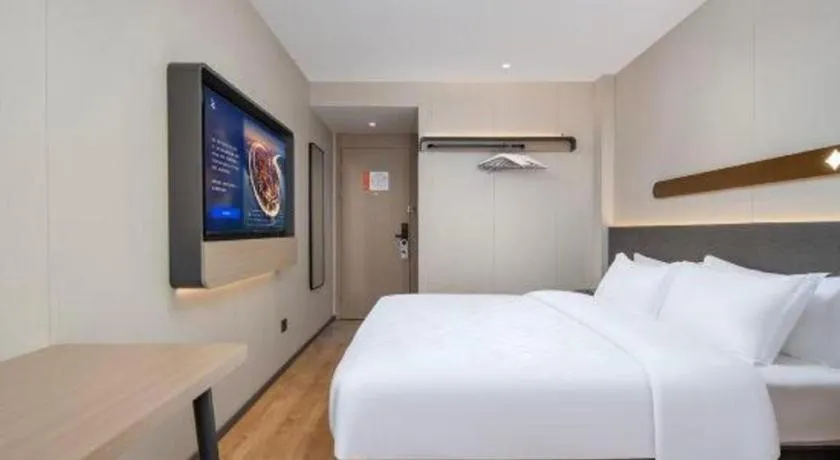 Bed in Jinjiang Inn Zhuhai Xiangzhou Qinglv Middle Road Theater