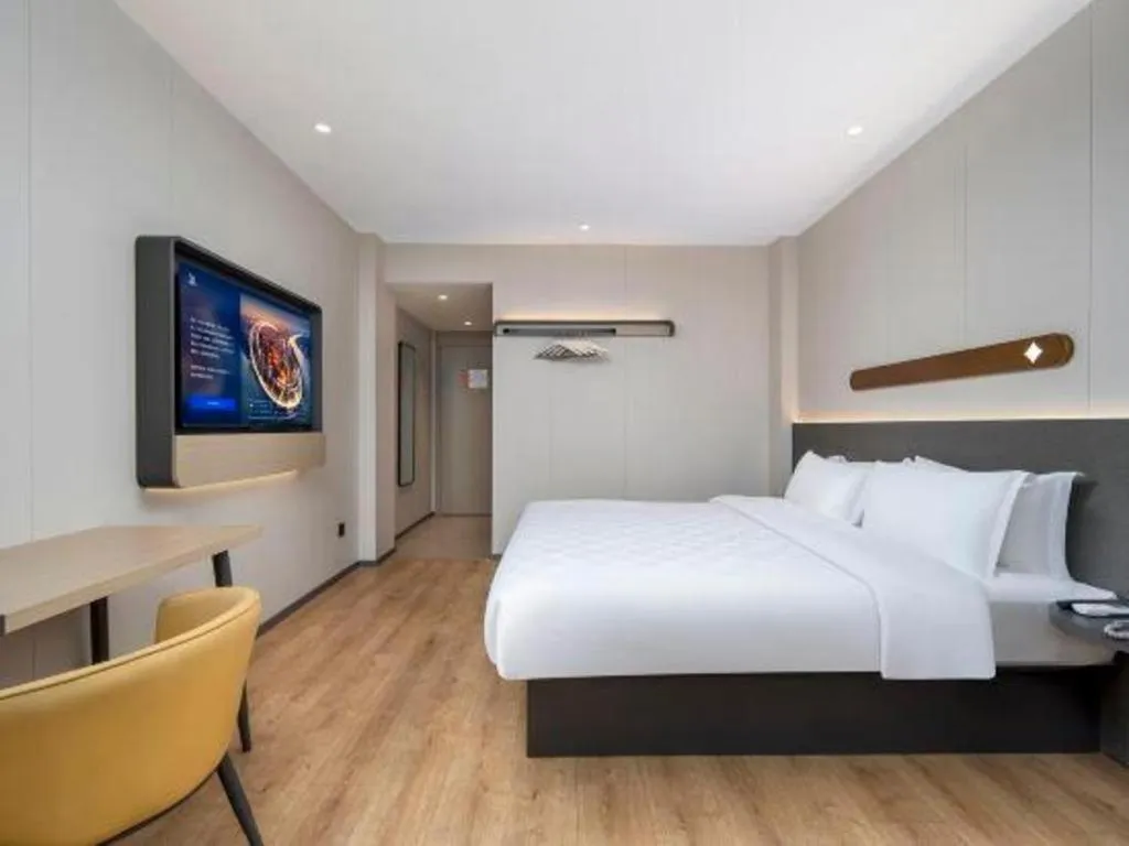 Bed in Jinjiang Inn Zhuhai Xiangzhou Qinglv Middle Road Theater