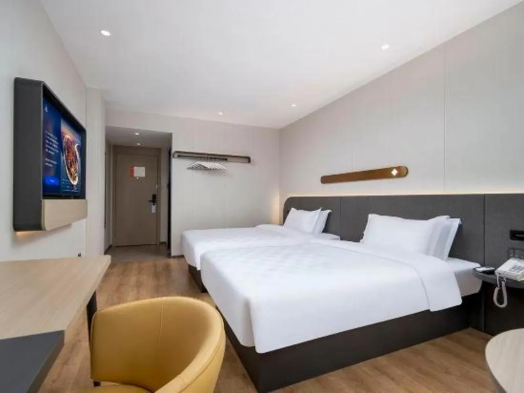 Bed in Jinjiang Inn Zhuhai Xiangzhou Qinglv Middle Road Theater