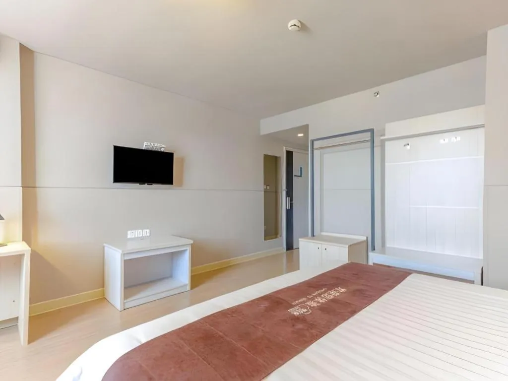 Bed in Jinjiang Inn Zhuhai Xiangzhou Qinglv Middle Road Theater