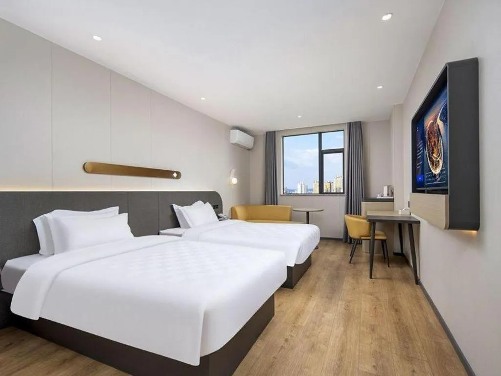 Bed in Jinjiang Inn Zhuhai Xiangzhou Qinglv Middle Road Theater