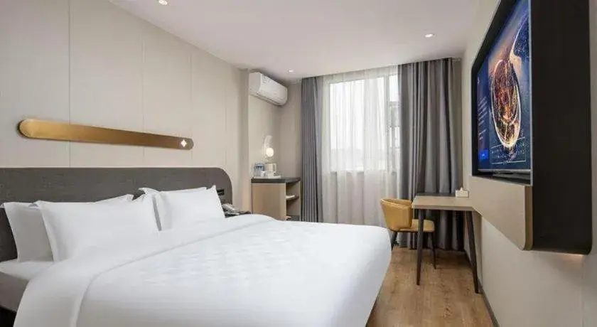 Bed in Jinjiang Inn Zhuhai Xiangzhou Qinglv Middle Road Theater Bed in Jinjiang Inn Zhuhai Xiangzhou Qinglv Middle Road Theater