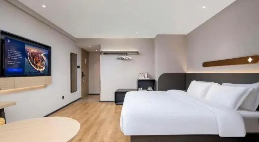 Bed in Jinjiang Inn Zhuhai Xiangzhou Qinglv Middle Road Theater Bed in Jinjiang Inn Zhuhai Xiangzhou Qinglv Middle Road Theater