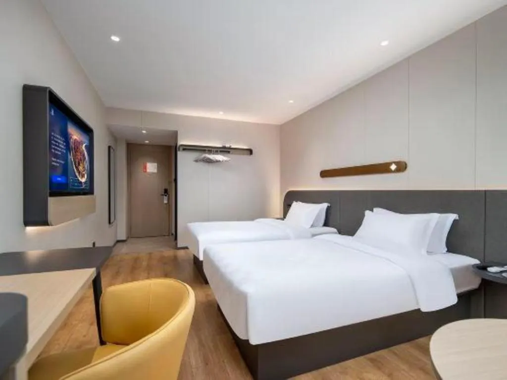 Bed in Jinjiang Inn Zhuhai Xiangzhou Qinglv Middle Road Theater