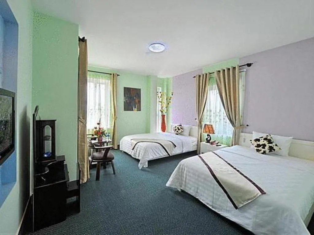 Bed in Ideal Hotel Hue