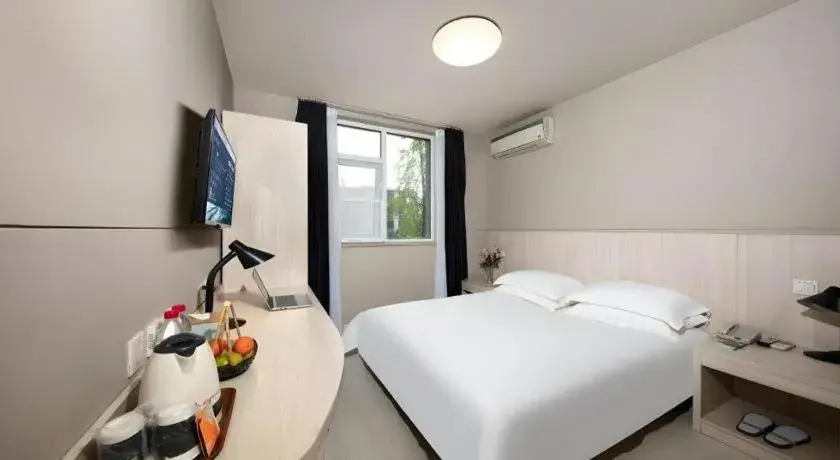 Bed in JinJiang Inn Chendu Taikoo Li Dongfeng Bridge Bed in JinJiang Inn Chendu Taikoo Li Dongfeng Bridge