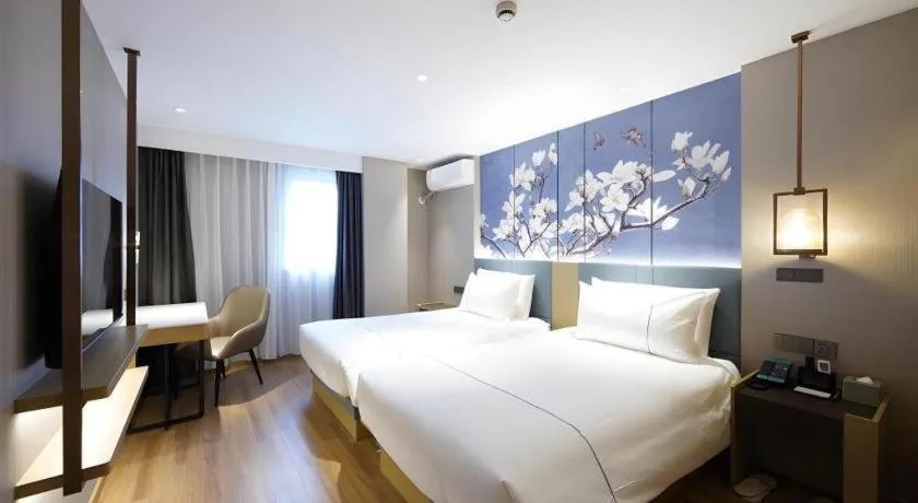 Bed in Jinjiang Inn Shanghai Lujiazui