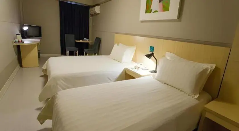 Bed in Jinjiang Inn Shanghai Lujiazui Bed in Jinjiang Inn Shanghai Lujiazui