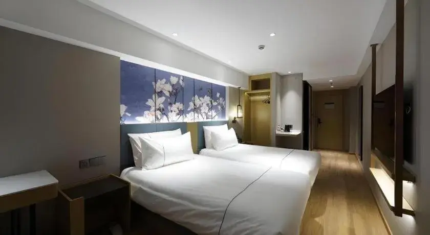 Bed in Jinjiang Inn Shanghai Lujiazui Bed in Jinjiang Inn Shanghai Lujiazui