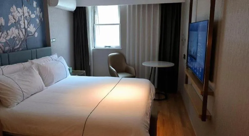 Bed in Jinjiang Inn Shanghai Lujiazui