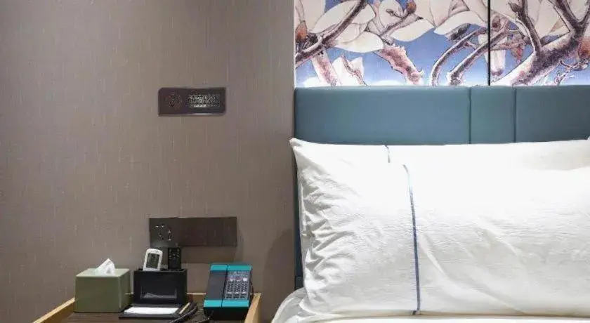 Bed in Jinjiang Inn Shanghai Lujiazui Bed in Jinjiang Inn Shanghai Lujiazui