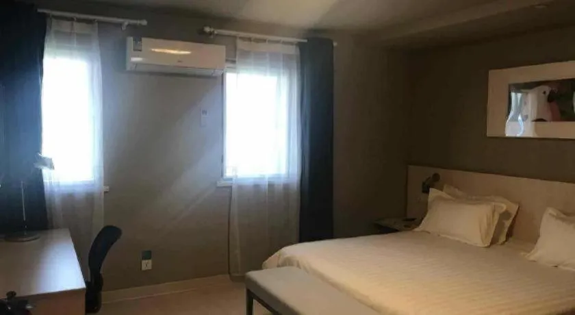 Bed in Jinjiang Inn Shanghai Lujiazui