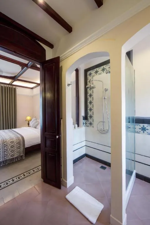 Bed in Le Bel Air Resort Luang Prabang