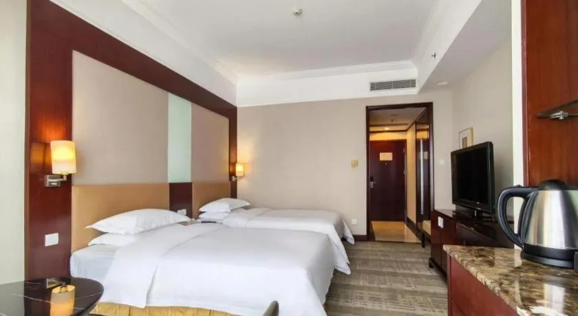 Bed in Golden Diamond Hotel Zhongshan