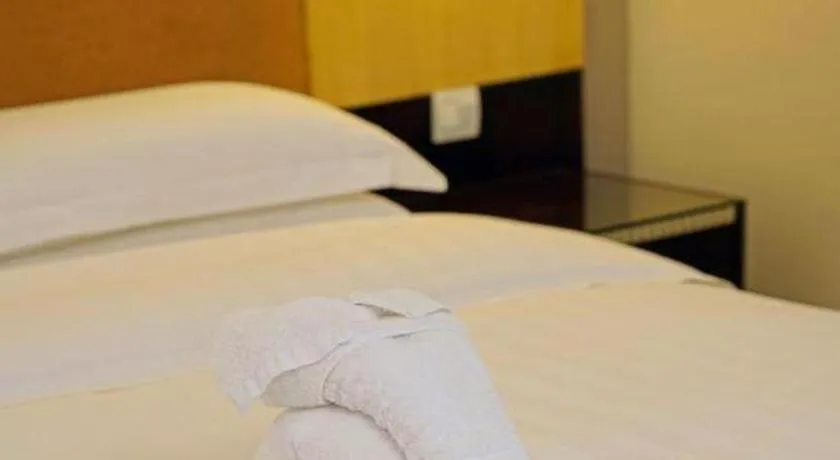 Bed in Golden Diamond Hotel Zhongshan